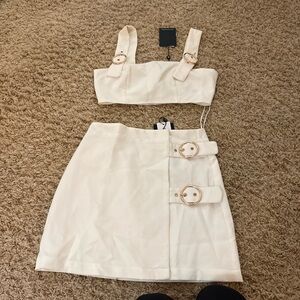 Elegant Cream Skirt with Buckle Detail